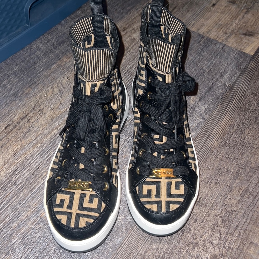 Mid top knit tennis shoes